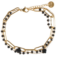 Bracelet triple rangs composé d'une chaîne en acier doré avec perles de couleur noire, une chaîne en acier doré, ainsi qu'une chaîne en acier doré avec deux pierres de couleur noire. Fermoir mousqueton avec 3 cm de rallonge.