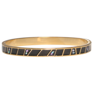 Bracelet jonc rigide fermé en acier doré et motifs en émail de couleur noir.
