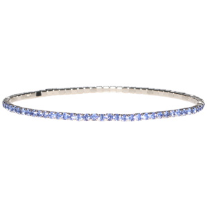 Bracelet fantaisie élastique en métal argenté et strass en cristaux synthétiques de couleur bleu.