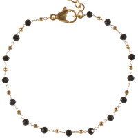 Bracelet composé d'une chaîne avec boules en acier doré et de perles de couleur noire. Fermoir mousqueton avec 4 cm de rallonge.