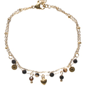 Bracelet double rangs composé d'une chaîne en acier doré, ainsi qu'une chaîne en acier doré, de perles et pampilles de couleur noire et des pampilles rondes et en forme de cœur en acier doré. Fermoir mousqueton avec 3 cm de rallonge.
