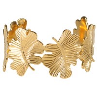 Bracelet manchette ouvert en forme de feuilles en acier doré.