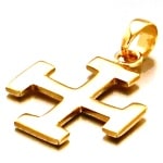 Pendentif croix scout en plaqué or.