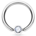 Piercing anneau en acier chirurgical 316L et cristal.