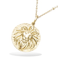 Pendentif rond représentant un lion en plaqué or jaune 18 carats. Vendu sans la chaîne.