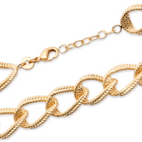 Bracelet chaîne en plaqué or jaune 18 carats. Fermoir mousqueton avec 2 cm de rallonge.