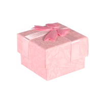 Boîte cadeaux écrin pour bague en carton de couleur rose avec nœud papillon. Intérieur en mousse.