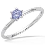 Bague solitaire en argent 925/000 rhodié et verre couleur tanzanite.