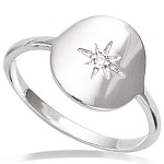 Bague en argent 925 rhodié avec motif étoile sertie d'un oxyde de zirconium blanc.