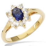 Bague en plaqué or jaune 18 carats sertie d'oxydes de zirconium blancs et de verre couleur bleue taille marquise.