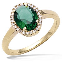 Bague solitaire en plaqué or 18 carats surmontée d'une pierre en verre couleur émeraude et d'oxydes de zirconium blancs.