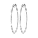 Boucles d'oreilles créoles en argent 925/000 rhodié et oxydes de zirconium.