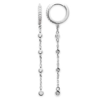 Boucles d'oreilles créoles en argent 925/000 rhodié pavée en partie d'oxydes de zirconium blancs et quatre oxydes de zirconium blancs sertis clos.