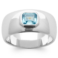 Bague en argent 925/000 rhodié surmontée d'un oxyde de zirconium de couleur bleue sertie clos de forme rectangulaire.