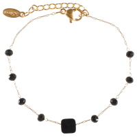 Bracelet composé d'une chaîne en acier doré surmonté de perles rondes de couleur noire et d'une perle de forme carré de couleur noire. Fermoir mousqueton avec 3 cm de rallonge.