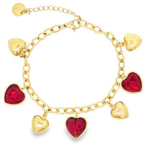 Laissez vous séduire par ce charmant bracelet en acier doré, orné de ravissants cristaux couleur rubis taille cabochon en forme de cœur. Un bijou délicat et raffiné, idéal pour exprimer votre amour et votre élégance. Les détails soignés et l'éclat chaleureux du doré font de ce bracelet un accessoire incontournable. Fermoir mousqueton avec 3 cm de rallonge.