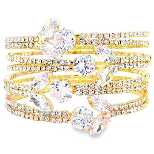 Rehaussez votre élégance avec ce magnifique bracelet jonc en métal doré, orné d'oxydes de zirconium à la taille brillant. Ce bijou captivant, avec son design raffiné et son éclat exceptionnel, est idéal pour ajouter une touche de luxe à votre tenue. Le sertissage méticuleux met en valeur la brillance des oxydes de zirconium, créant un effet saisissant.