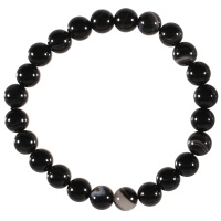 Bracelet boules élastique de perles en pierre naturelle de couleur noire.