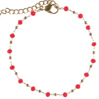 Bracelet composé d'une chaîne avec boules en acier doré et de perles de couleur rouge. Fermoir mousqueton avec 4 cm de rallonge.