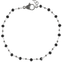 Bracelet composé d'une chaîne avec boules en acier argenté et de perles de couleur noire. Fermoir mousqueton avec 4 cm de rallonge.
