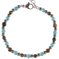 Bracelet composé de perles en acier argenté et de perles de couleur marron et bleue turquoise. Fermoir mousqueton avec 4 cm de rallonge.