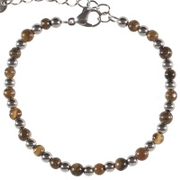 Bracelet composé de perles en acier argenté et de perles de couleur marron. Fermoir mousqueton avec 4 cm de rallonge.