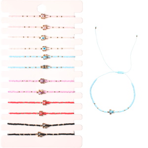 Bracelet fantaisie composé d'un cordon de couleur, de perles multicolores et d'une tortue de mer en métal doré avec un œil de Turquie en émail de couleur. 6 coloris différents. Vendu à l'unité. Votre préférence en commentaire.