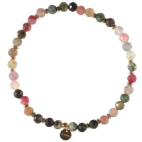 Bracelet élastique composé de perles en acier doré et perles en pierre naturelle.