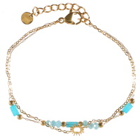 Bracelet double rangs composé d'une chaîne avec un soleil en acier doré et d'une chaîne avec perles en acier doré et des perles de couleur turquoise. Fermoir mousqueton avec 3 cm de rallonge.
