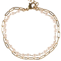 Bracelet double rangs composé d'une chaîne en acier doré et d'une chaîne en acier doré et de perles d'imitation. Fermoir mousqueton avec 3 cm de rallonge.