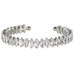 Bracelet jonc ouvert flexible en acier argenté serti 4 griffes de cristaux.