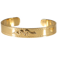 Bracelet jonc ouvert rigide surmonté d'un serpent en acier doré.