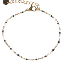 Bracelet composé d'une chaîne en acier doré et de perles en émail de couleur noire. Fermoir mousqueton avec 3 cm de rallonge.