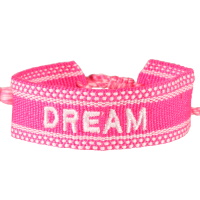 Bracelet fantaisie avec le mot Dream en textile de couleur rose. Fermoir cordon nœud coulissant avec pompons.