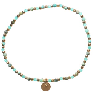 Bracelet élastique composé de perles en acier doré et perles de couleur verte.
