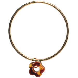 Bracelet jonc rigide fermé en acier doré avec un pendant en forme de fleur de couleur marron.