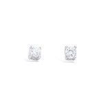 Boucles d'oreilles puces en argent 925/000 rhodié et oxydes de zirconium sertis 4 griffes.