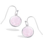 Boucles d'oreilles pendantes en argent 925/000 rhodié et pierres de couleur rose sertis clos.