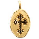 Pendentif croix en plaqué or 18 carats sertie de pierres synthétiques noires.