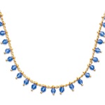 Collier en plaqué or avec des pierres synthétiques bleues.