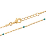 Bracelet en plaqué or et perles en émail.