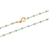 Bracelet en plaqué or 18 carats avec perles de miyuki de couleur turquoise. Fermoir mousqueton avec 2 cm de rallonge.