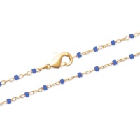 Bracelet en plaqué or 18 carats avec perles de miyuki de couleur bleue. Fermoir mousqueton avec 2 cm de rallonge.