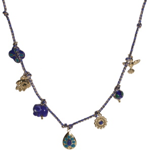 Collier composé d'un cordon multicolore finissant par des pompons et des breloques oiseau et fleur de lotus en acier doré, d'un éléphant en céramique, d'une perle avec motifs de fleur en émail, d'un trèfle en acier doré pavé d'émail de couleur, d'une fleur en acier doré sertie d'un cabochon et d'un pendentif en forme de goutte en acier doré avec motifs en émail de couleur et serti d'un cabochon.
