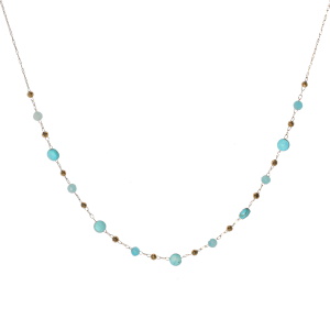 Collier composé d'une chaîne en acier doré et de perles de couleur turquoise. Fermoir mousqueton avec 5 cm de rallonge.