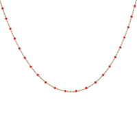 Collier composé d'une chaîne en acier doré et de perles en émail de couleur rouge. Fermoir mousqueton avec 5 cm de rallonge.