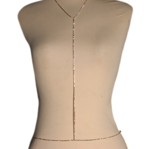 Collier de corps composé d'une chaîne en acier doré sertie de strass.<br/Fermoir mousqueton avec 7 cm de rallonge pour le collier et 25 cm de rallonge pour la taille.