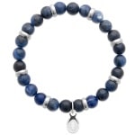Bracelet boules élastique avec perles en pierre jaspe bleu et pendant motif gueule de requin en acier argenté.