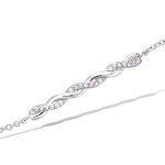 Bracelet avec tresse en argent 925/000 rhodié et oxydes de zirconium.