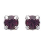 Boucles d'oreilles en argent 925/000. Cristal couleur prune.